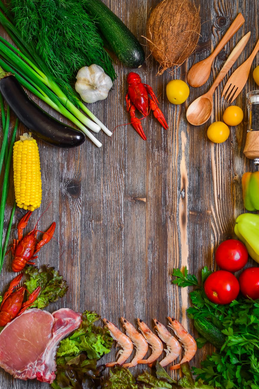 vegetables and tomatoes on cutting board